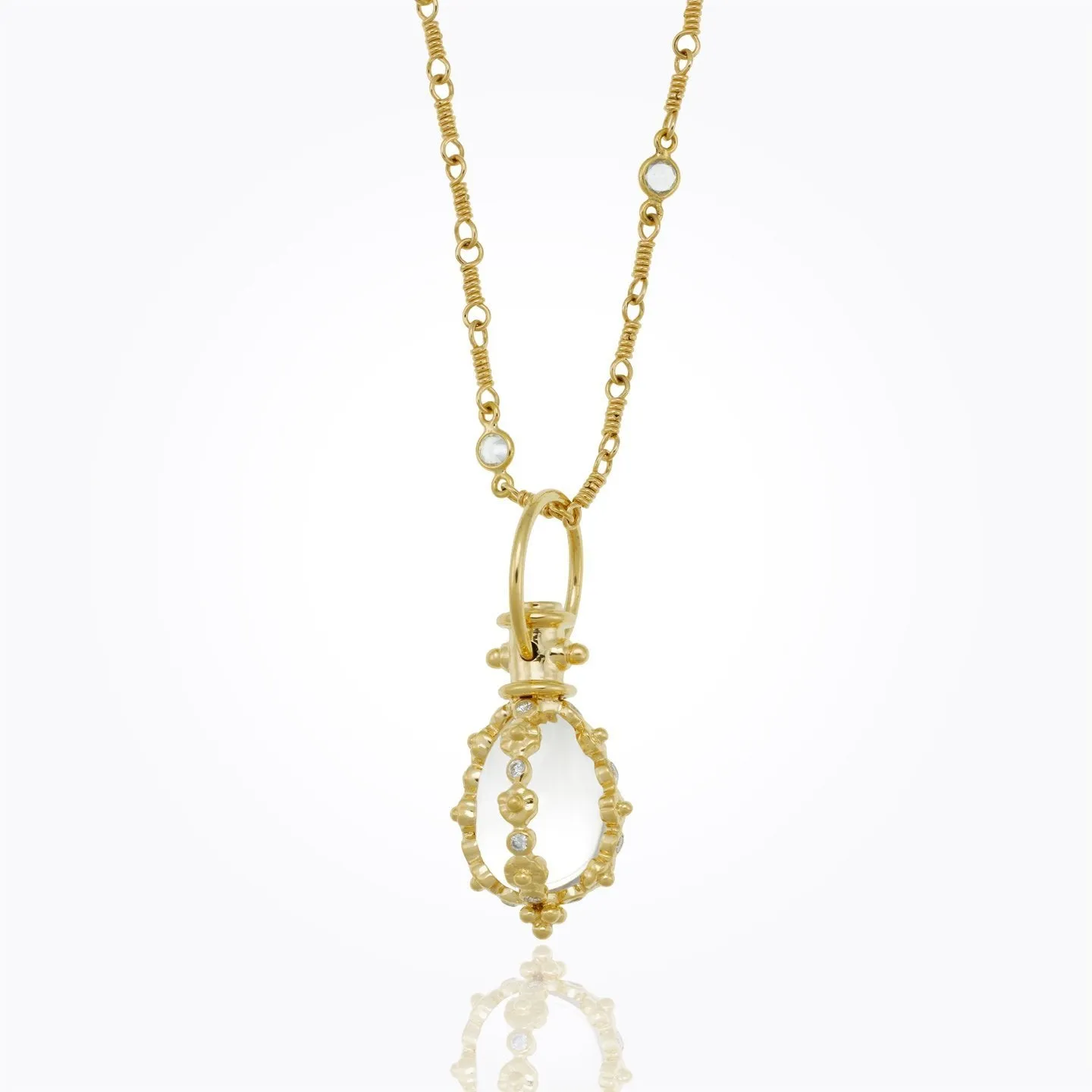 18K Fiori Amulet with oval rock crystal and diamond