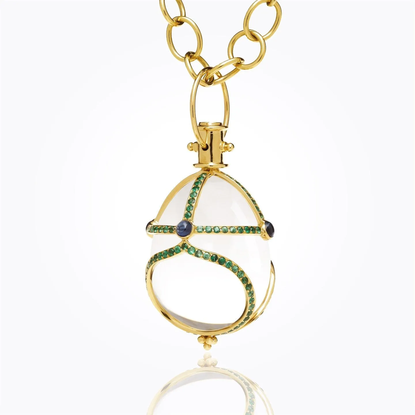 18K Stupa Amulet with oval rock crystal, blue sapphire and tsavorite