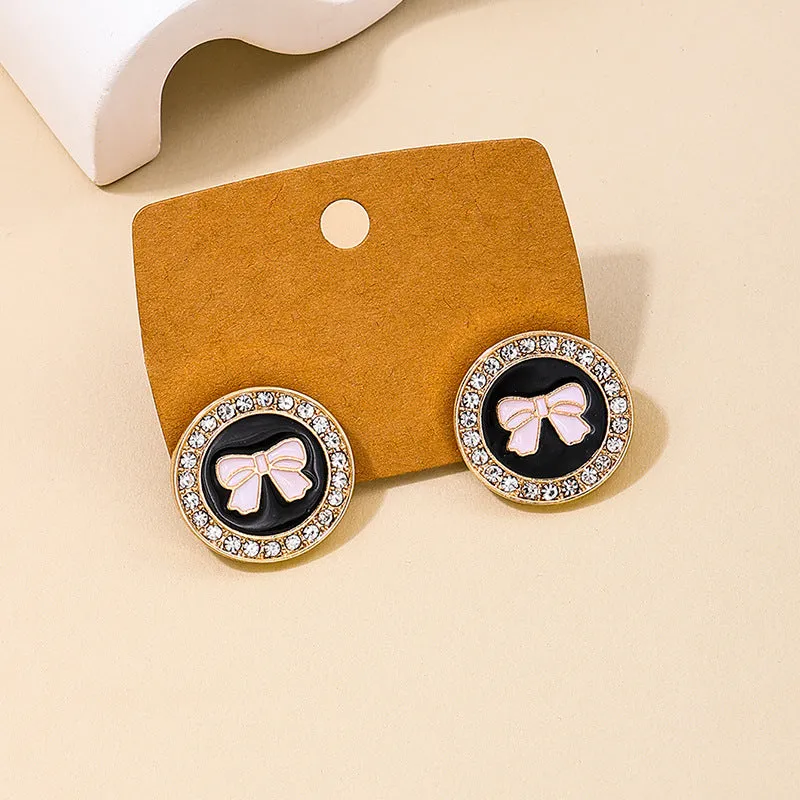 Bow Earrings and Geometric Rings Set with a touch of Vintage Charm