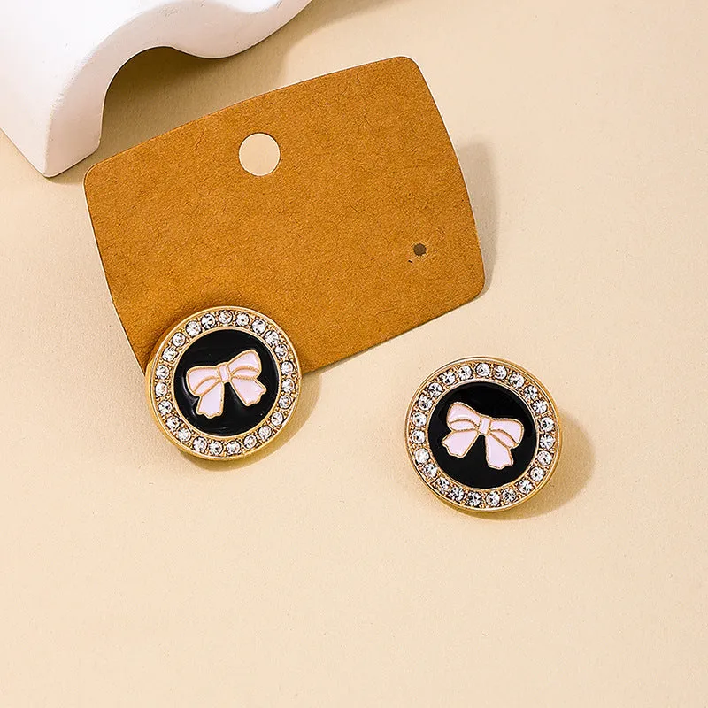 Bow Earrings and Geometric Rings Set with a touch of Vintage Charm