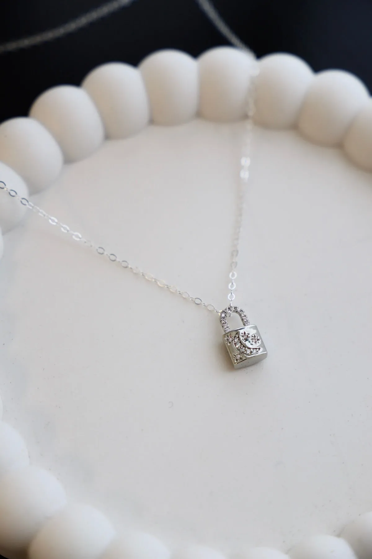 CELESTIAL LOCK CHARM NECKLACE