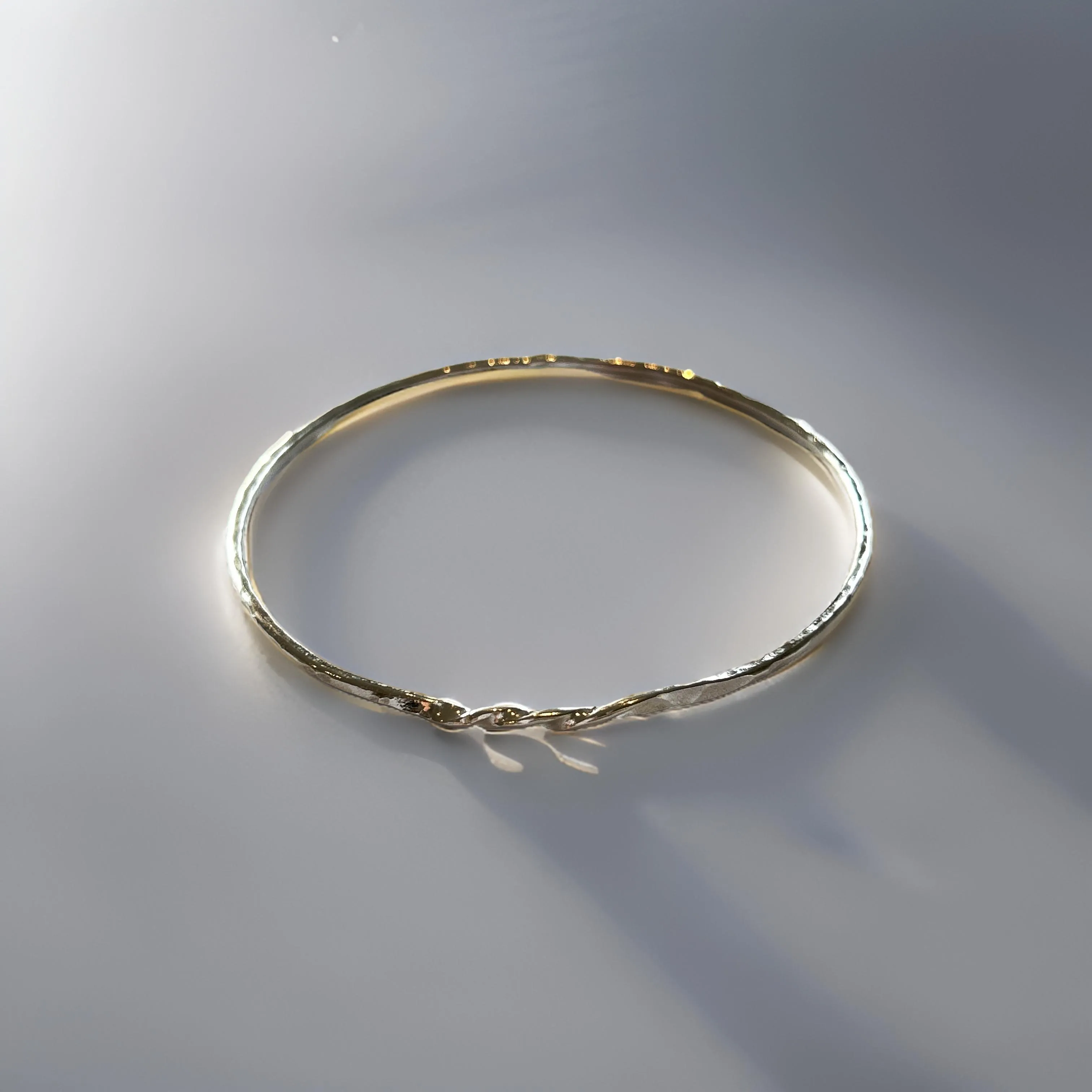 Sterling Silver Bangle With a Twist