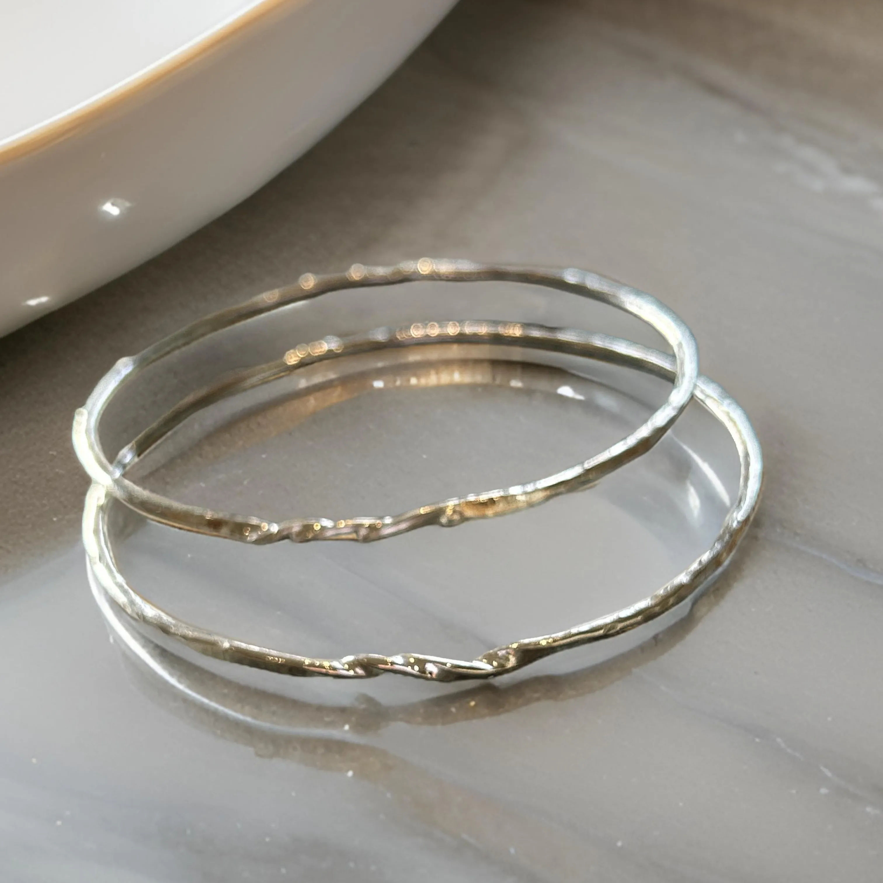 Sterling Silver Bangle With a Twist