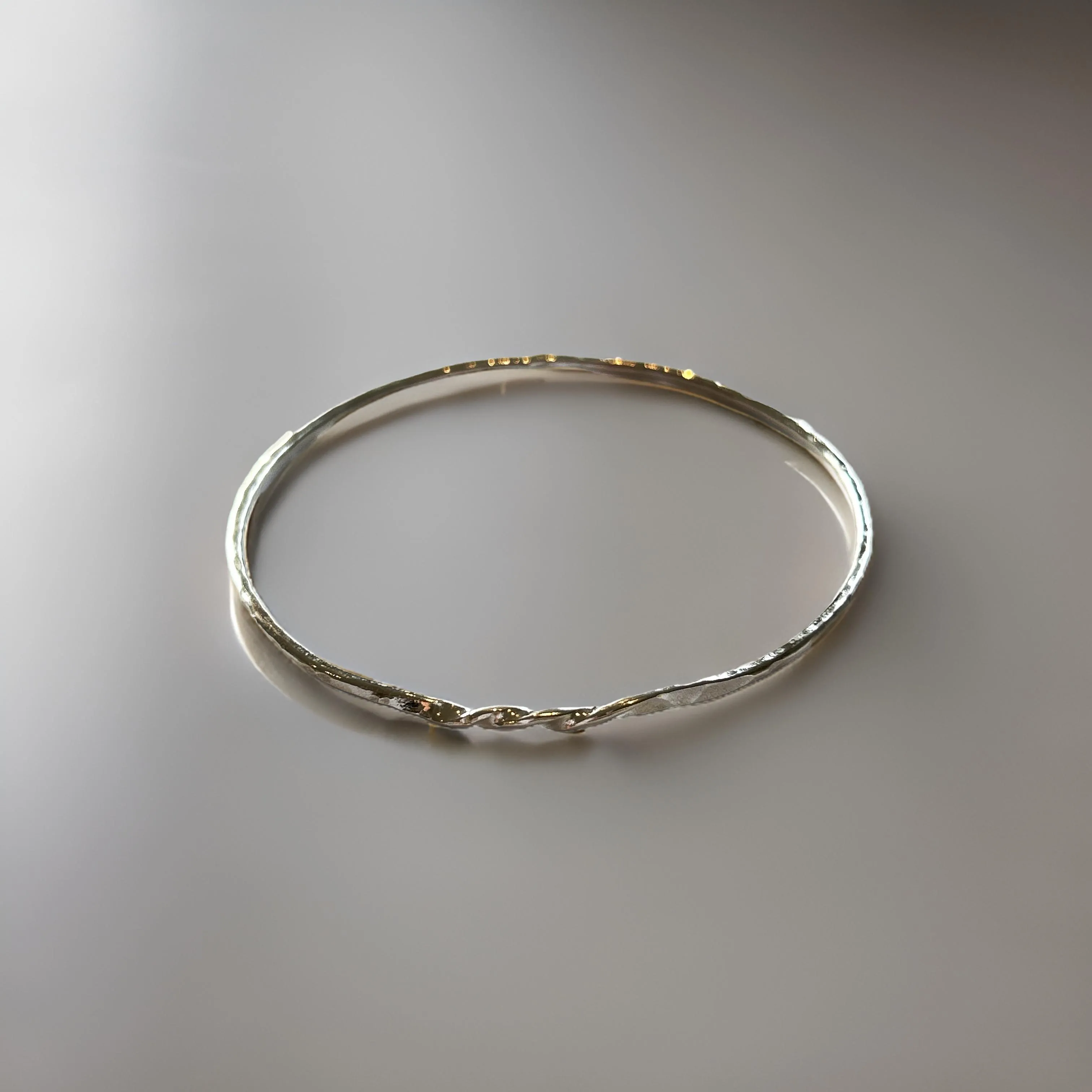 Sterling Silver Bangle With a Twist